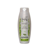 Witte Musk Shampoo voor Bedekt Haar in witte fles met groene bladeren decoratie